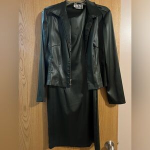 Dark green fitted satin-like dress with matching jacket.